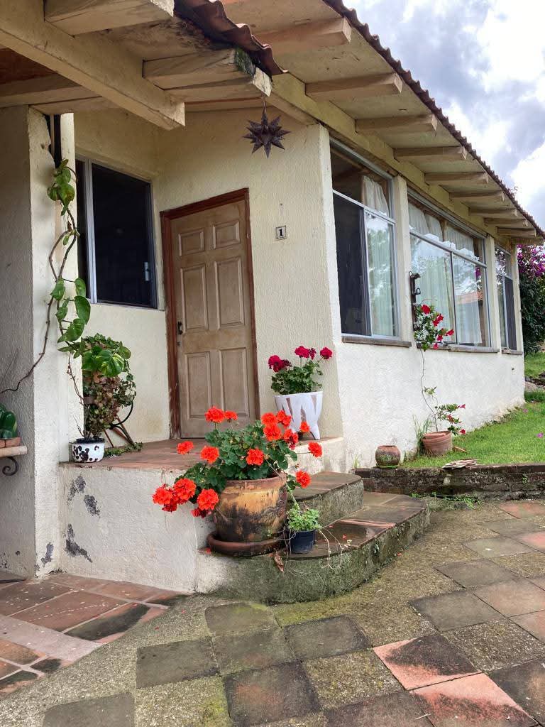 TERRENO CON CASA Y CABAÑAS EN VENTA EN TACICUARO, MICH