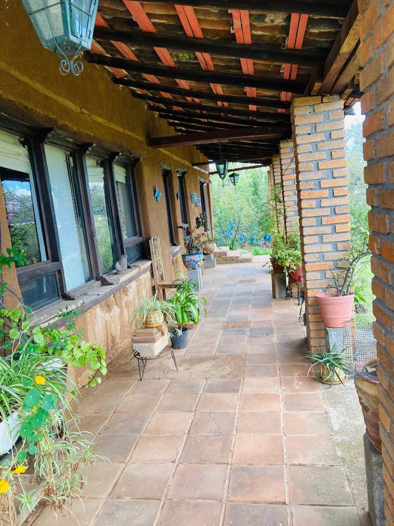 TERRENO CON CASA Y CABAÑAS EN VENTA EN TACICUARO, MICH