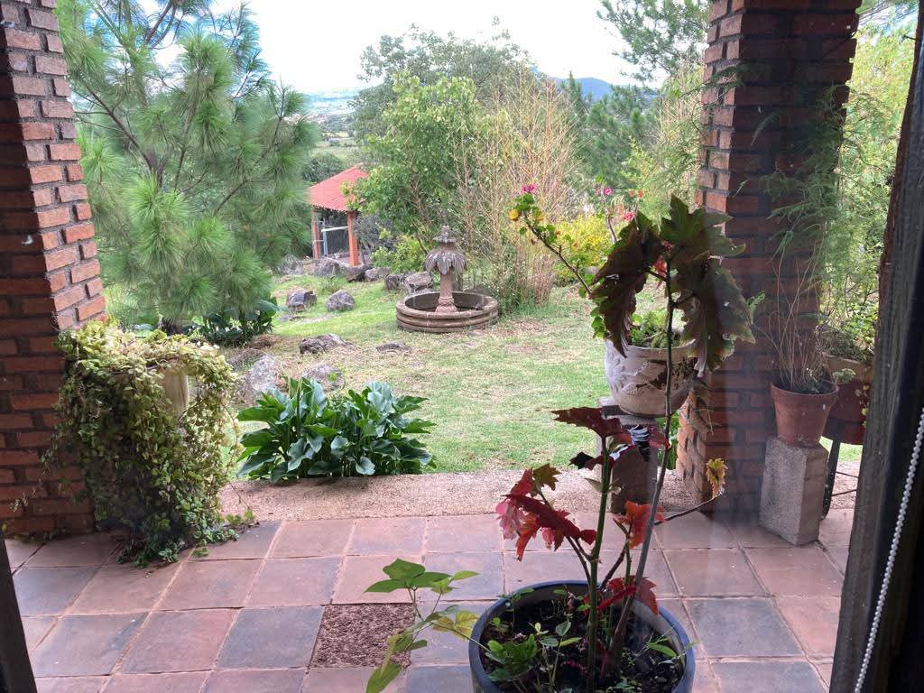 TERRENO CON CASA Y CABAÑAS EN VENTA EN TACICUARO, MICH